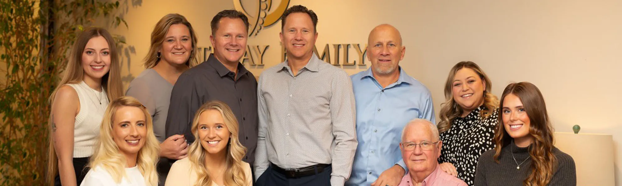 Chiropractor Loveland CO David And Michael Hughes With Team New Patient Special Offer
